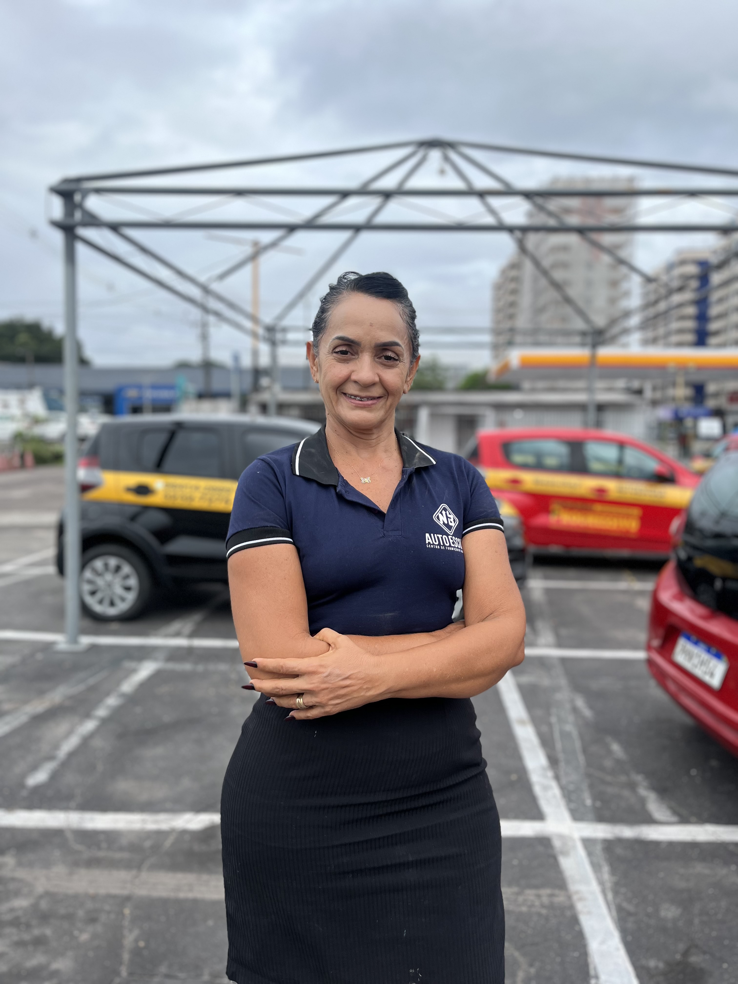 Equipe e veículo da Autoescola NB